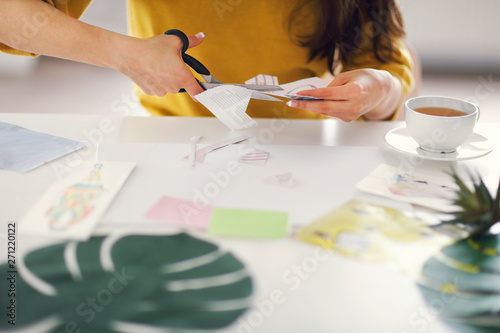Young brunette woman creating her Feng Shui wish map Fototapet