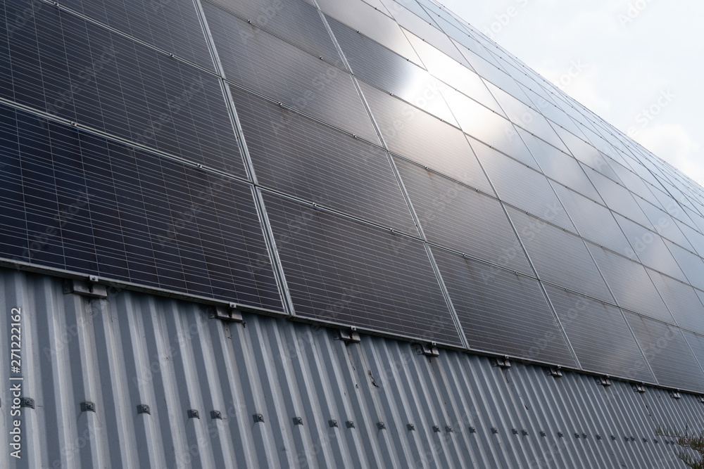 Image showcasing Photovoltaic power plant on roof building Solar Energy concept of ...