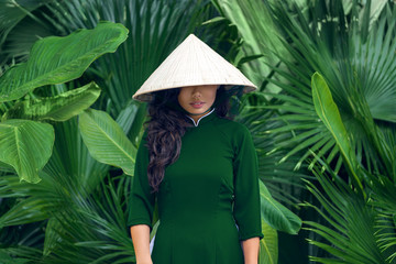 Young asian woman in traditional vietnamese dress ao dai