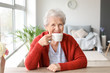 © Pixel-Shot - Senior woman drinking tea at home
