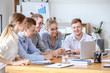 © Pixel-Shot - Group of young people at business meeting in office