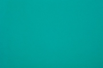 Poster - Jade green felt texture abstract art background. Colored construction paper surface. Empty space.