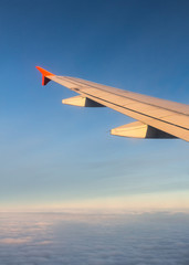 Wall Mural - plane wings and the sky view from the passenger window