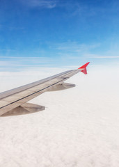Wall Mural - plane wings and the sky view from the passenger window