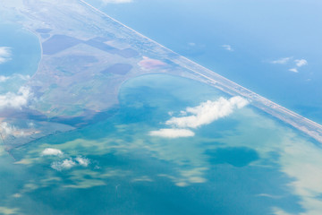 Wall Mural - looking through window aircraft, landing to the airport