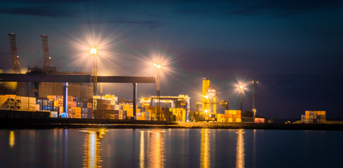 Night view of the container terminal. Commercial port, City Odessa, Ukraine, June 2019. Night Lights.