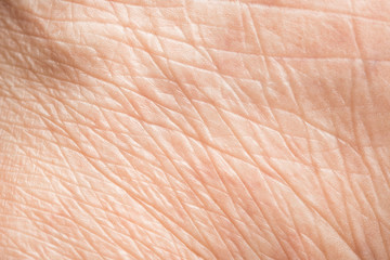 close up old skin texture with wrinkles on body human
