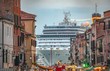 Italy beauty, like a movie scene, gigantic cruise ship leaving Venice , Venezia