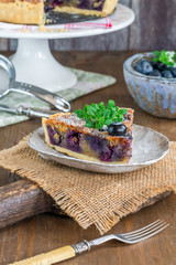 Wall Mural - Blueberry and almond tart dusted with icing sugar