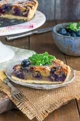 Wall Mural - Blueberry and almond tart dusted with icing sugar