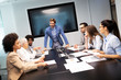 © NDABCREATIVITY - Business people conference and meeting in modern office