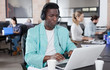 © JackF - African freelancer in headset watching webinar