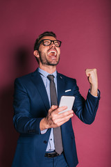 Wall Mural - Businessman using the mobile phone