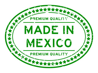 Canvas Print - Grunge green premium quality made in Mexico oval rubber seal stamp on white background