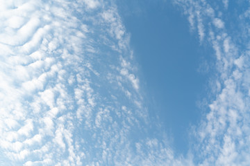 white soft cloud texture on blue sky backdrop