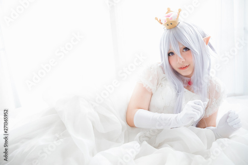 Portrait of vampire dracula young woman dress in white tone room halloween conce Wallpaper Mural