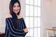 © 88studio - asian woman smiling posing at home