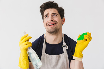 Wall Mural - Handsome brunette houseman wearing apron