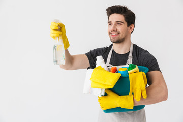 Wall Mural - Handsome brunette houseman wearing apron