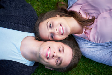 Poster - Young couple strolling in the park