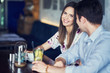 © Kalim - Romantic couple dating in restaurant