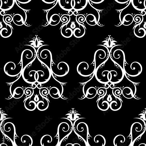 Seamless pattern with floral ornament. Black and white background.