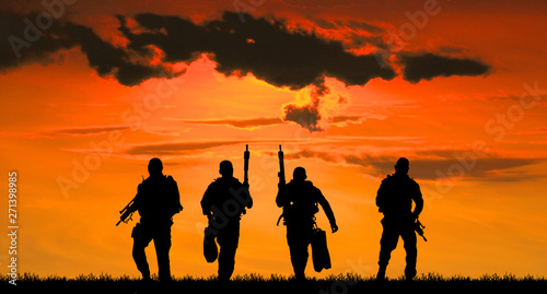 Navy seal silhouettes on sunrise Wallpaper Mural