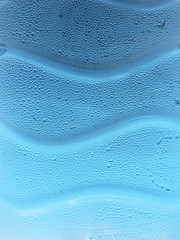 Wall Mural - cool water drop on plastic bottle