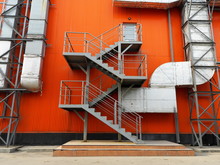  Stairs On The Orange Wall