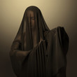 Girl in a black transparent veil on the face. Conceptual portrait in the studio. Minimalism.