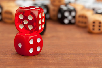 Dice on a wooden table. Concept for business risk.