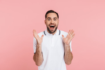 Poster - Portrait of an excited bearded man standing