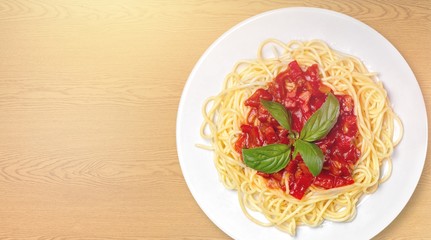 Delicious pasta on white plate on  background