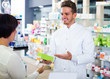 © JackF - pharmacist  helping customers