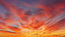 Beautiful Cloudscape At Sunset With Red Clouds On Sky
