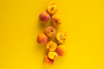 Wall Mural - fresh organic ripe juicy peach and a half isolated, vegeterian snacks