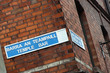 temple bar street sign on red brick wall in dublin as symbol for drinking, beer and irish pubs