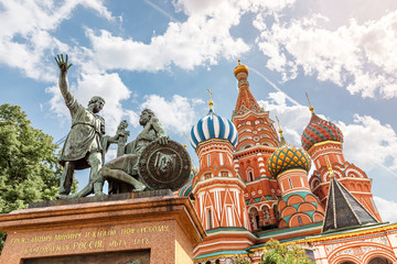 Famous landmark St Basil Cathedral with Minin and Pogarsky statue