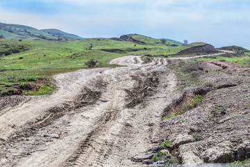 Canvas Print - dirt road and mountains