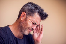 Man Feels Headache Isolated. People, Healthcare And Medicine Concept