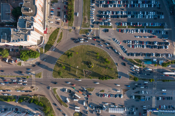 Wall Mural - aerial 4k top view of traffic in a circle