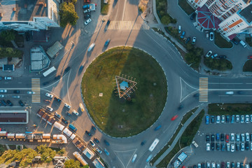 Wall Mural - aerial 4k top view of traffic in a circle