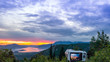 Sunset mountain peaks sky panorama. Mountain peaks sunset view. Mountain sunset sky clouds