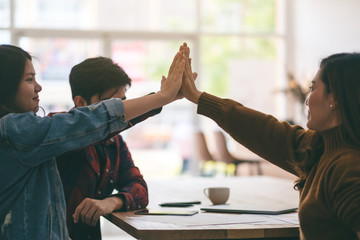 Poster - An asian businessman putting their hands together in the meeting