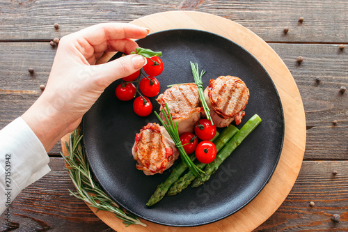 Restaurant Food Presentation Chef Decorating A Pork Dish Grilled