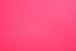 Hot pink felt texture abstract art background. Solid color construction paper surface. Empty space.