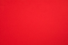 Crimson Red Felt Texture Abstract Art Background. Colored Fabric Fibers Surface. Empty Space.