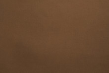 Brown Felt Texture Abstract Art Background. Solid Color Construction Paper Surface. Empty Space.