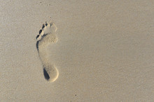 Top View On Footprint In The Sand