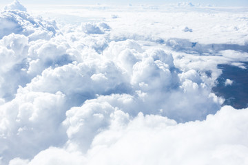 Wall Mural - clouds and sky from airplane window view
